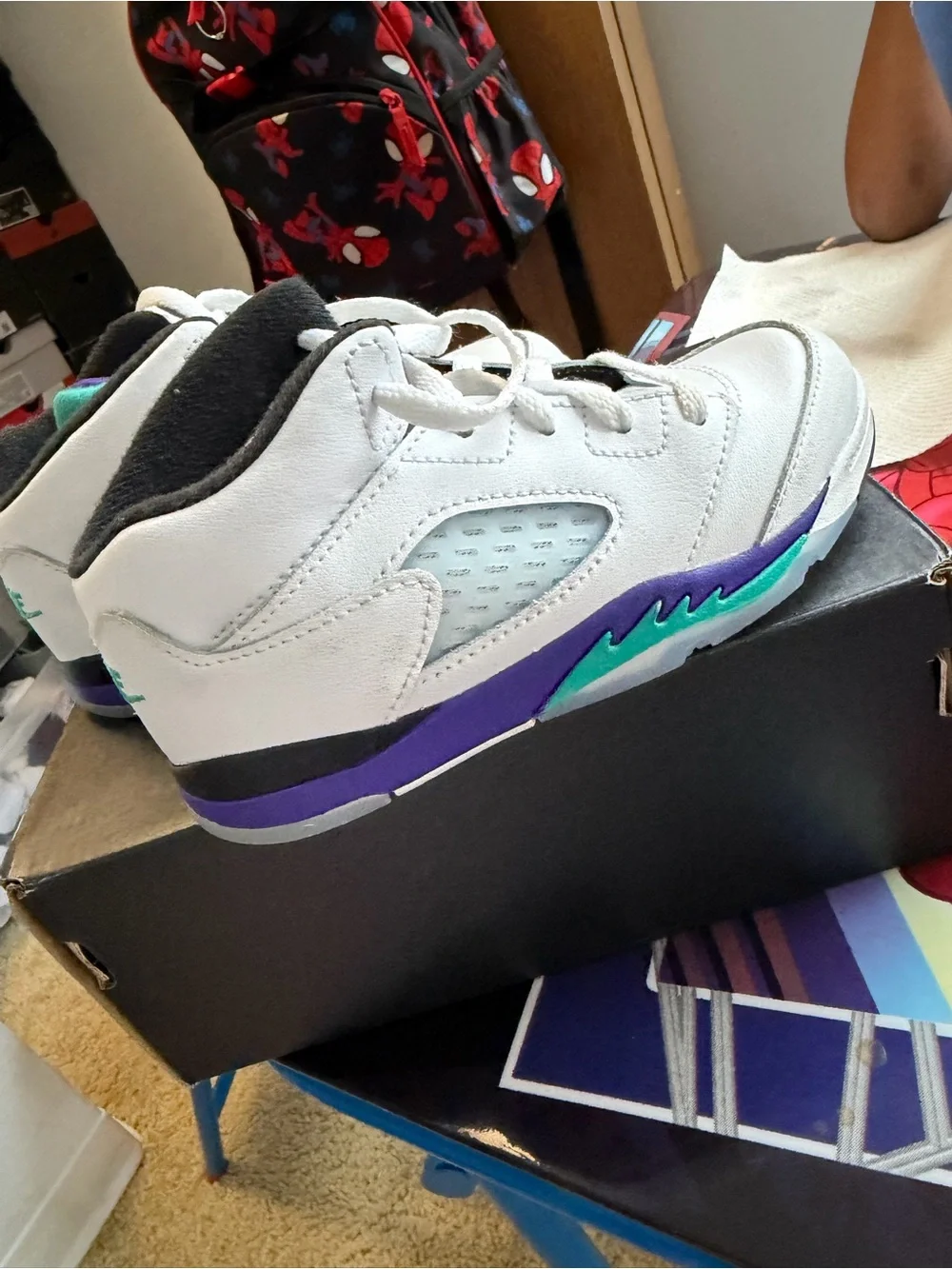 Jordan Kids White Sneakers with Purple and Teal Accents